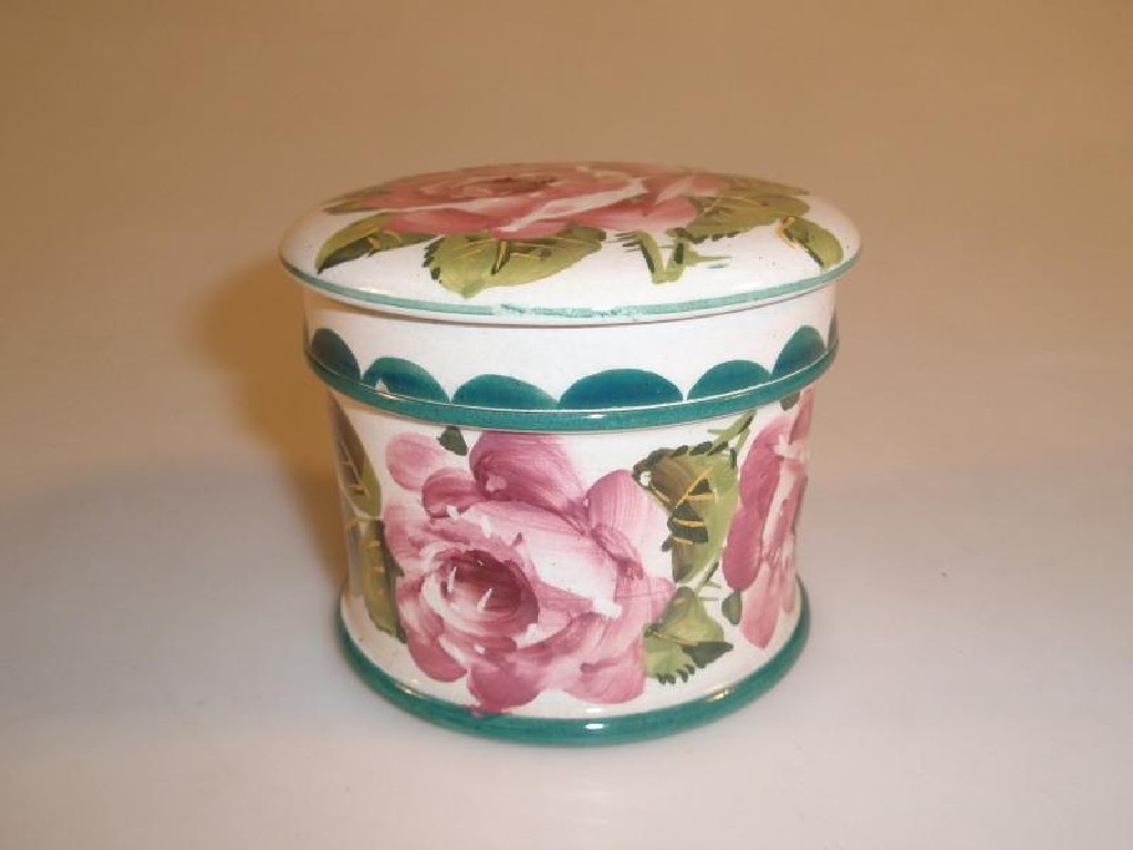 Appraisal: A Wemyss ware circular box and cover painted with pink