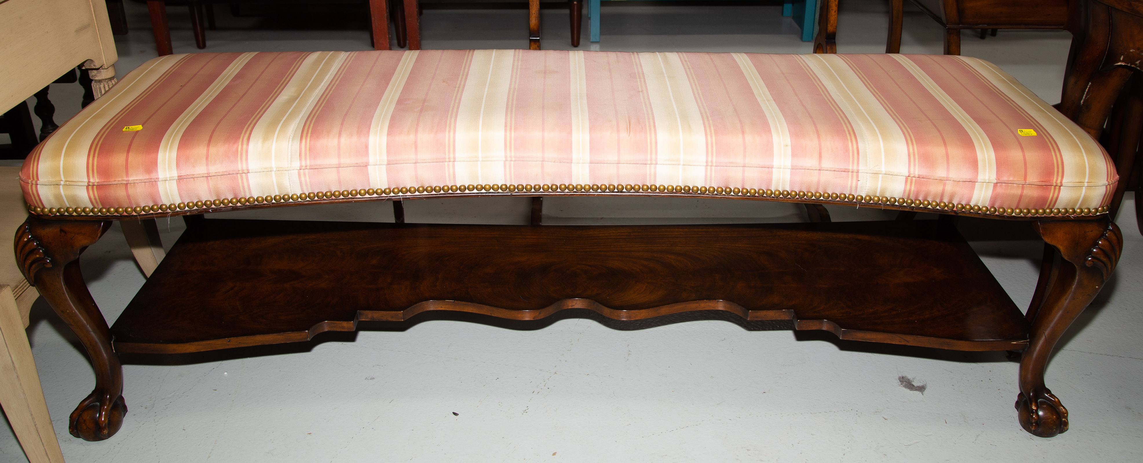 Appraisal: CHIPPENDALE STYLE MAHOGANY WINDOW BENCH Modern with stretcher shelf in