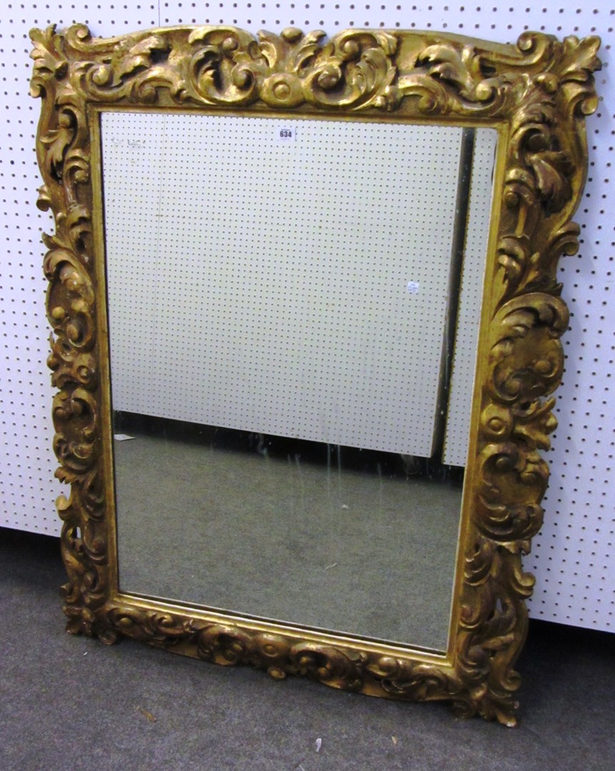 Appraisal: A gilt framed rectangular wall mirror with acanthus moulded frame