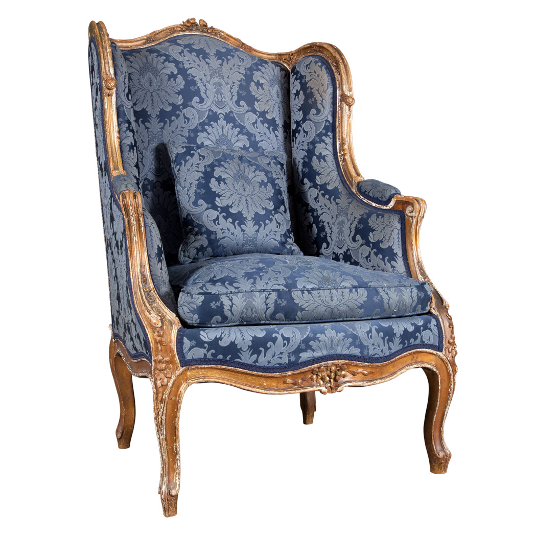 Appraisal: Louis XV Style Giltwood Bergere With a floral crest raised