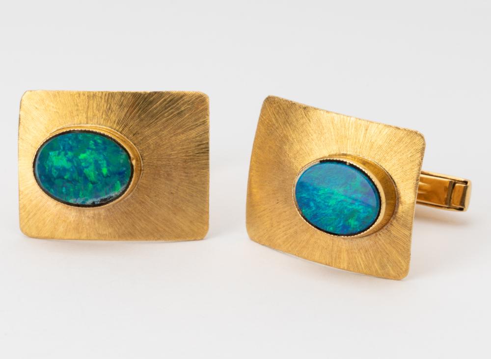 Appraisal: KARAT YELLOW GOLD OPAL-DOUBLET CUFFLINKSThe rectangular shape cufflinks with satin