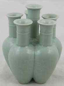 Appraisal: A Chinese ceramic six stem ''tulip'' vase in celadon glaze