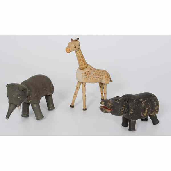 Appraisal: Schoenhut Elephant Hippo and Giraffe Three Schoenhut circus animals a