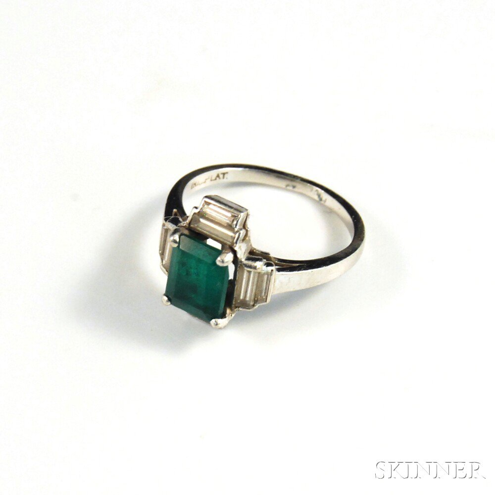 Appraisal: Platinum Emerald and Diamond Ring the center emerald-cut stone measuring