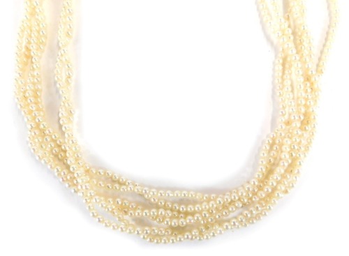 Appraisal: A three double strand cultured pearl necklace each with small