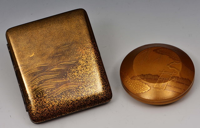 Appraisal: A Japanese gold lacquer circular kogo and cigarette casethe kogo