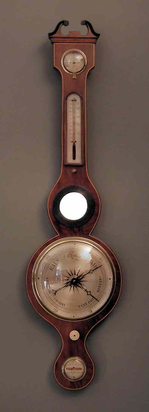 Appraisal: An early th Century mahogany cased wheel barometer thermometer and