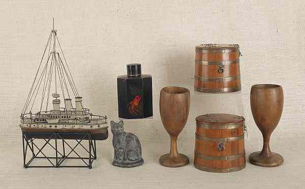 Appraisal: Tin ship model together with a white metal cat doorstop