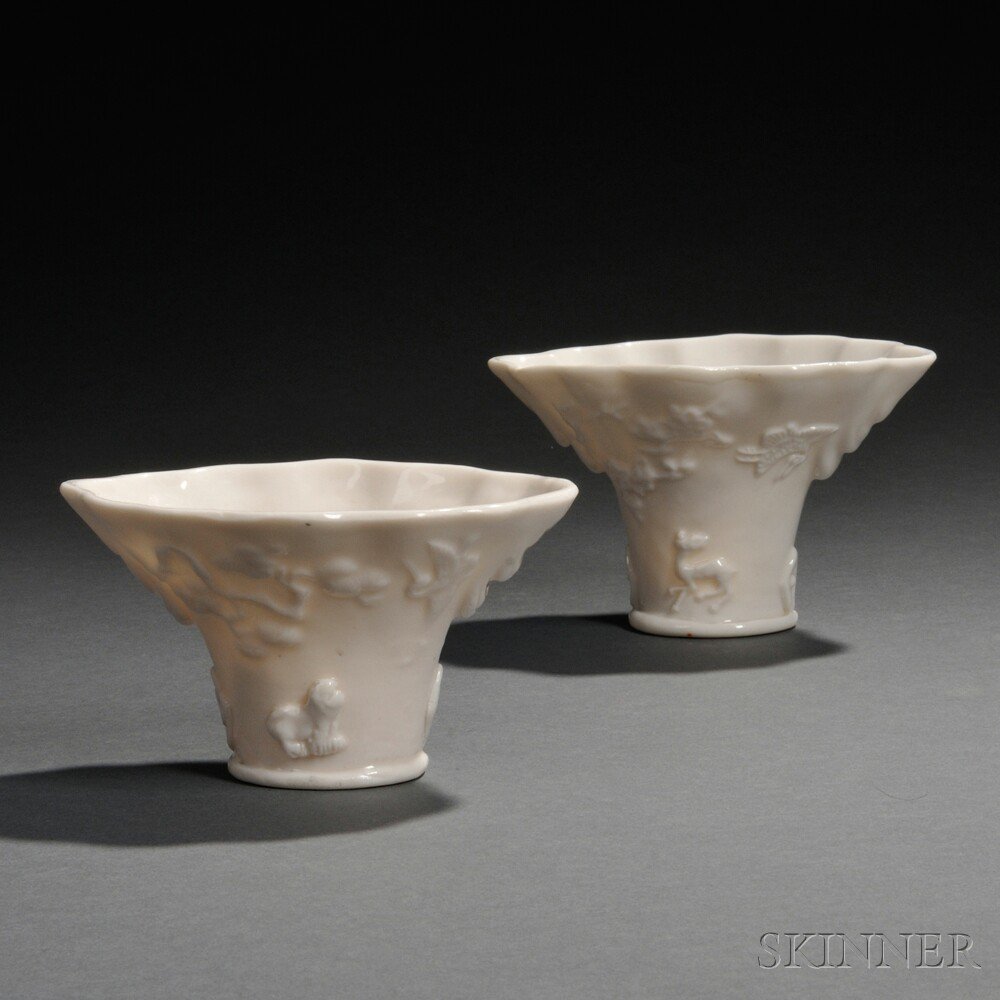 Appraisal: Two Blanc-de-Chine Libation Cups China Qing Dynasty rhinoceros horn cup