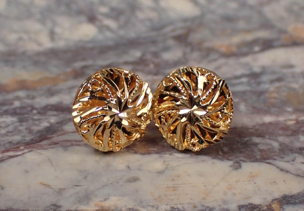 Appraisal: PAIR OF EIGHTEEN KARAT GOLD EAR STUDS each yellow gold