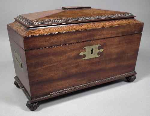 Appraisal: A William IV mahogany tea caddy of sarcophagus shape with