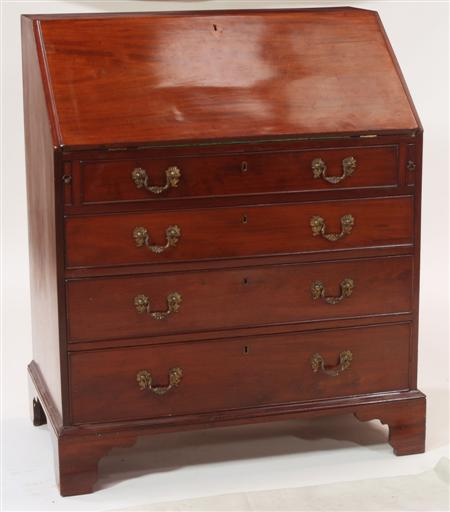 Appraisal: A George III mahogany bureau the moulded fall-flap enclosing skiver