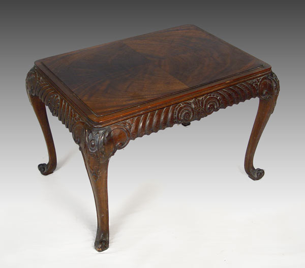 Appraisal: TURN OF THE CENTURY MAHOGANY COCKTAIL TABLE Butterfly veneer top