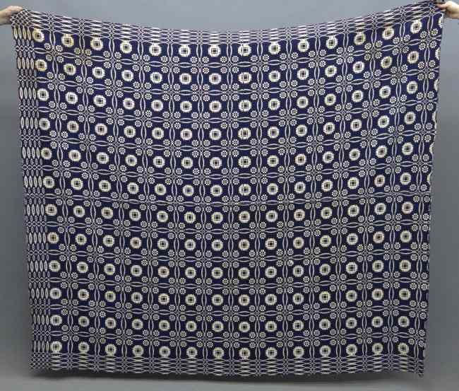 Appraisal: th c blue and white geometric coverlet '' x ''