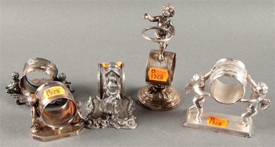 Appraisal: Five American silver-plated napkin rings with motifs of putti or