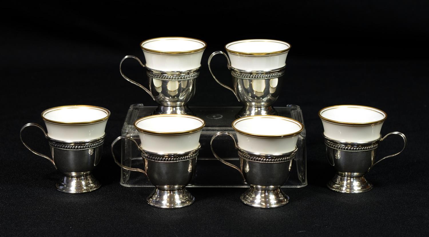 Appraisal: Set of Sterling Silver Demitasse Cups with Bone China Inserts