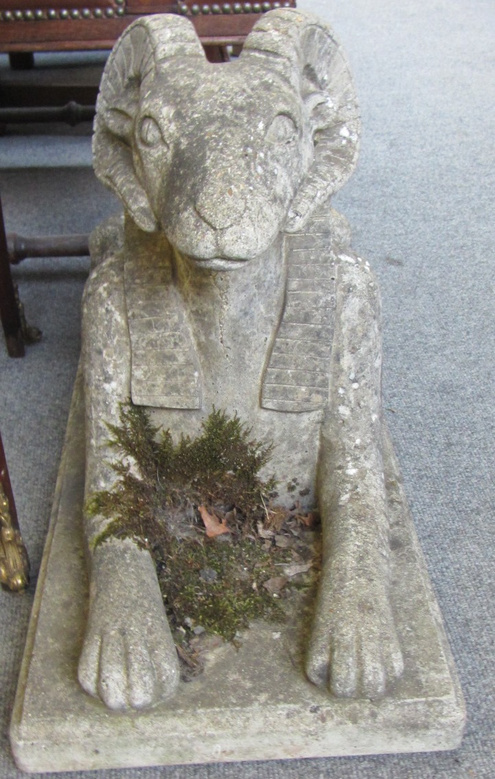 Appraisal: A pair of reconstituted stone figures of Sphinx on rectangular