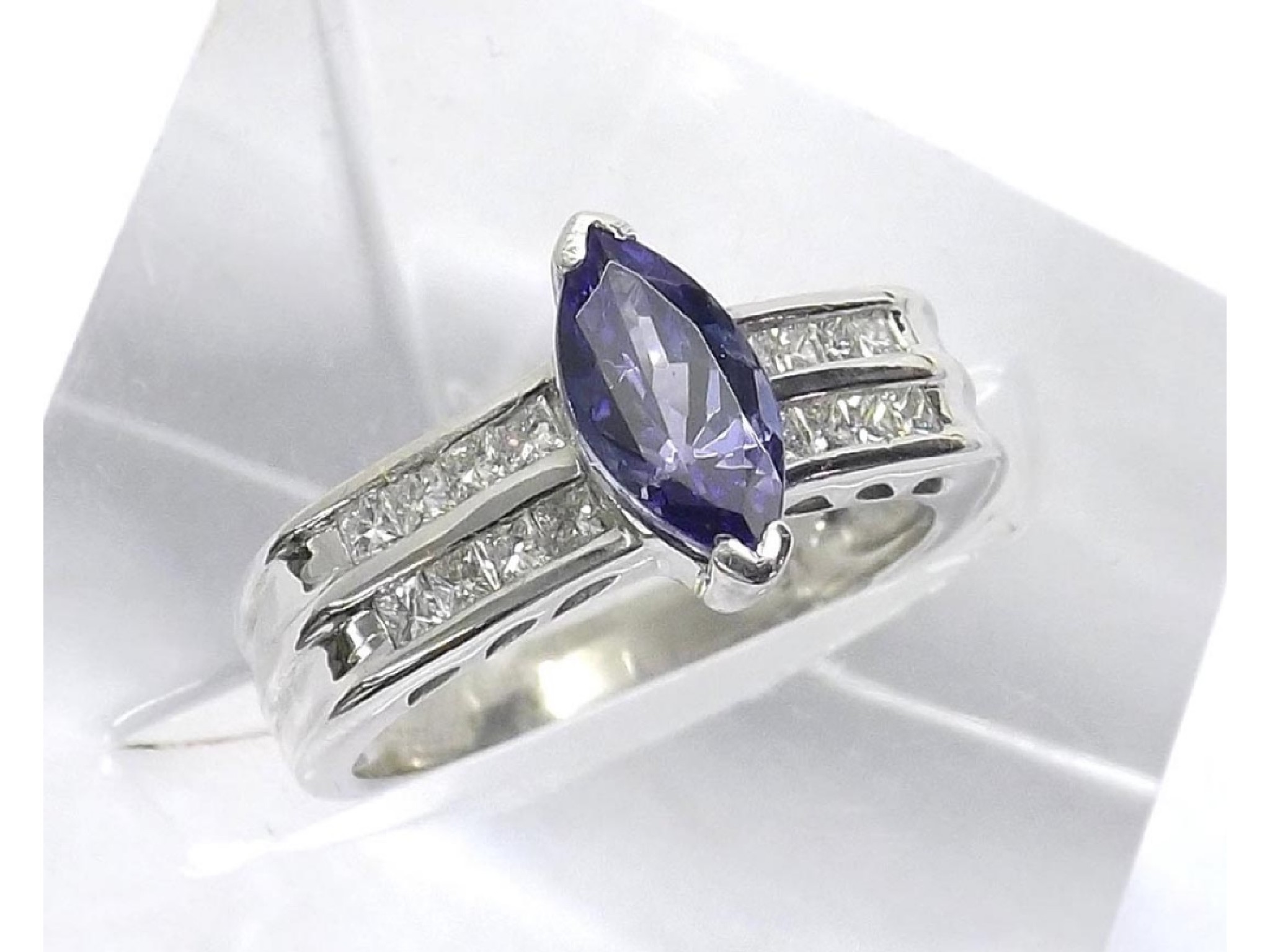 Appraisal: - -a Modern ct white gold marquise tanzanite and princess-cut