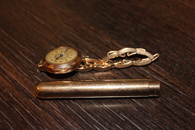 Appraisal: A CT GOLD PENCIL HOLDER engraved C P Attenborough together