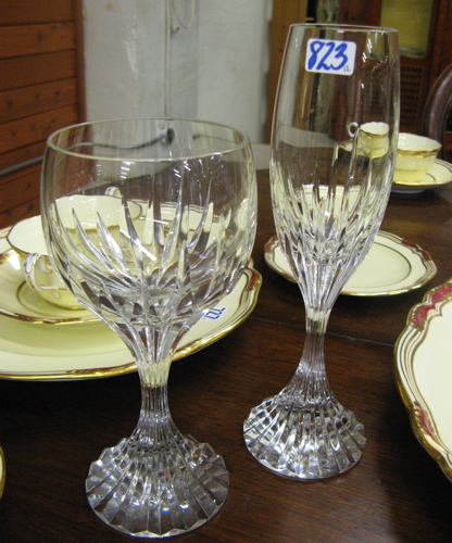 Appraisal: SET OF TWELVE BACCARAT CUT CRYSTAL STEMWARE in a ray