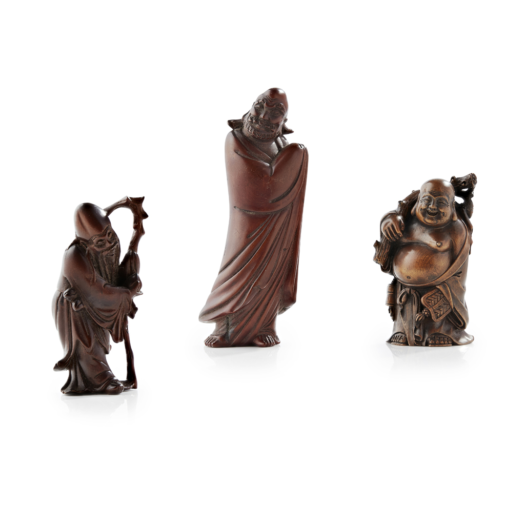 Appraisal: THREE CARVED WOOD FIGURES OF IMMORTALS MEIJI PERIOD depicting Hotei