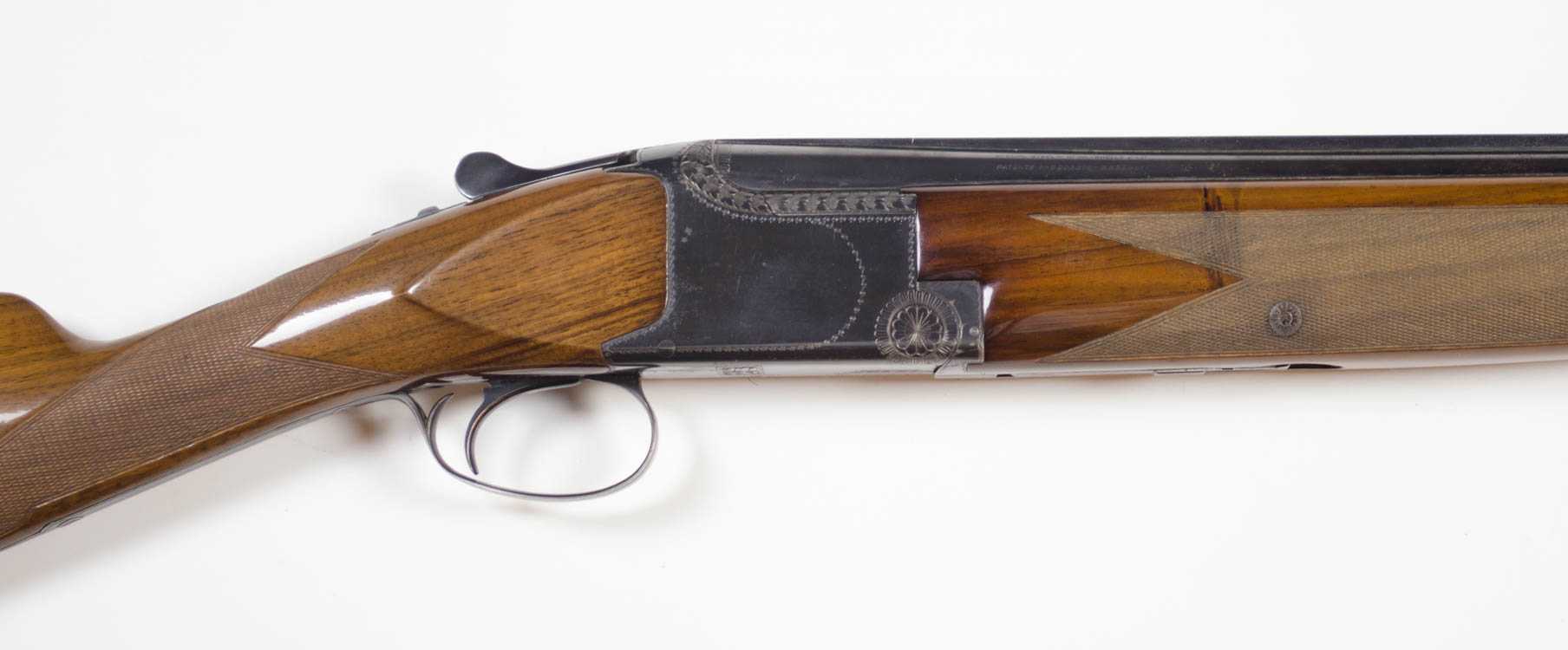 Appraisal: BROWNING SUPERPOSED SUPERLIGHT O U DOUBLE BARREL SHOTGUN gauge solid