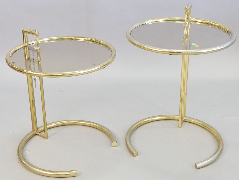 Appraisal: Pair Eileen Gray style adjustable tables tubular gold tone steel