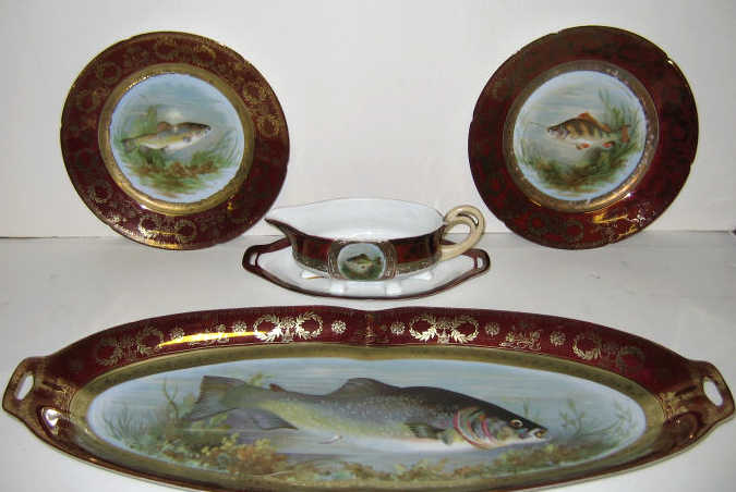 Appraisal: PFEIFFER LOWENSTEIN SCHLAGENWALD BOHEMIA Twelve-piece porcelain fish service comprising ten