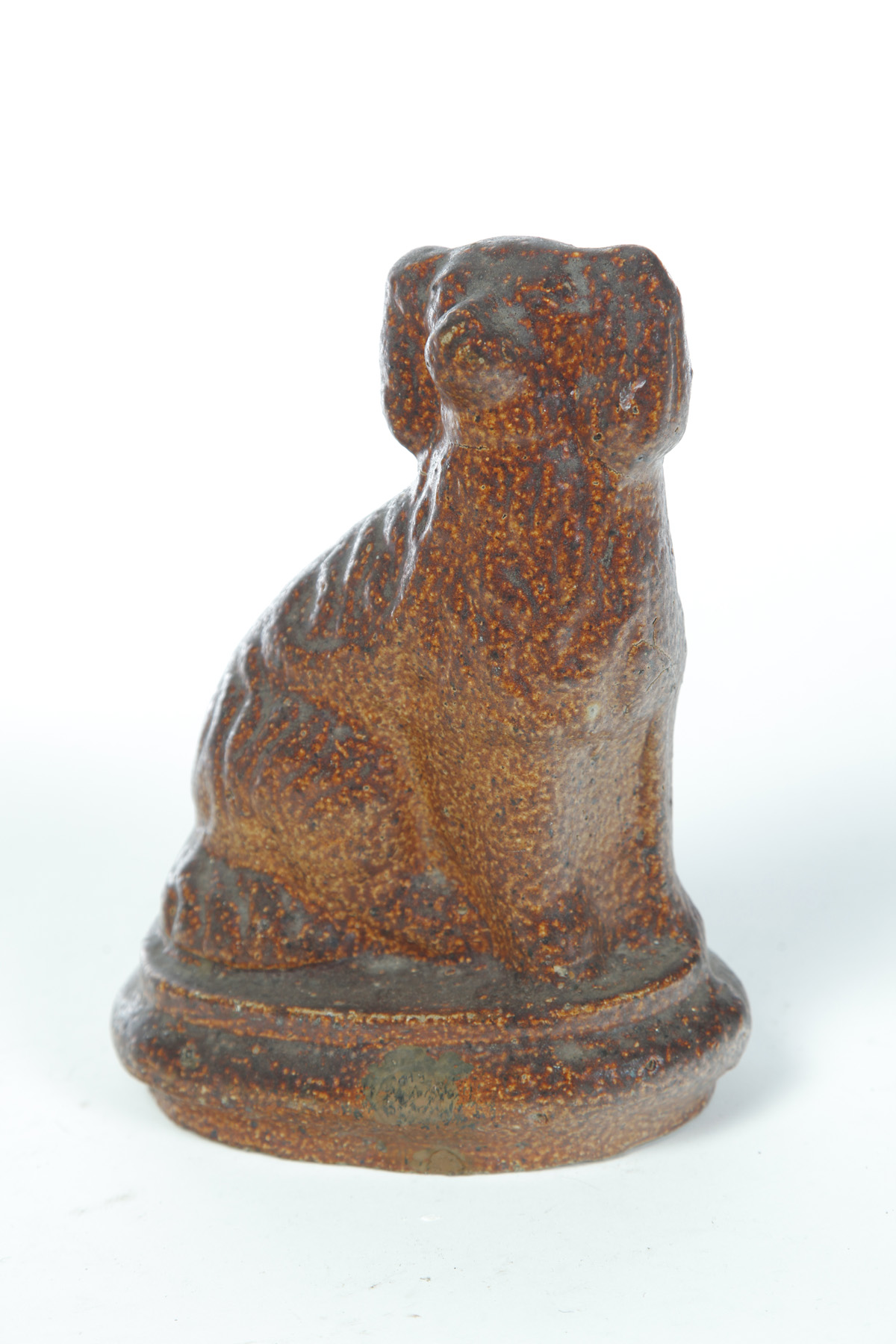 Appraisal: OHIO SEWERTILE DOG Early th century Seated spaniel on solid