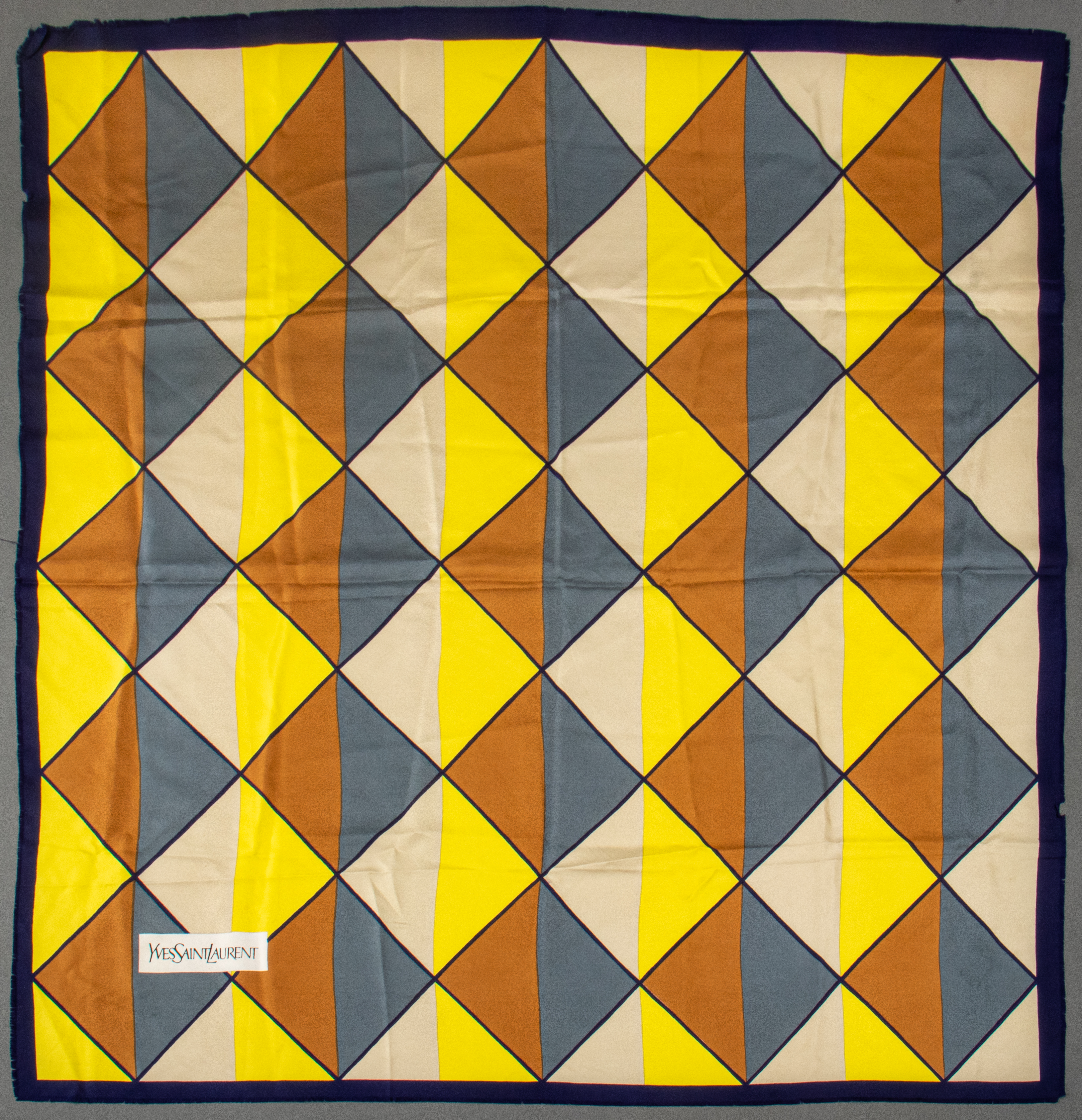 Appraisal: YVES SAINT LAURENT GEOMETRIC SILK SCARF Yves Saint Laurent silk