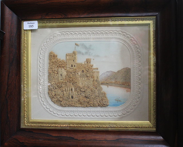 Appraisal: A VICTORIAN CORK PICTURE depicting a castle on the edge