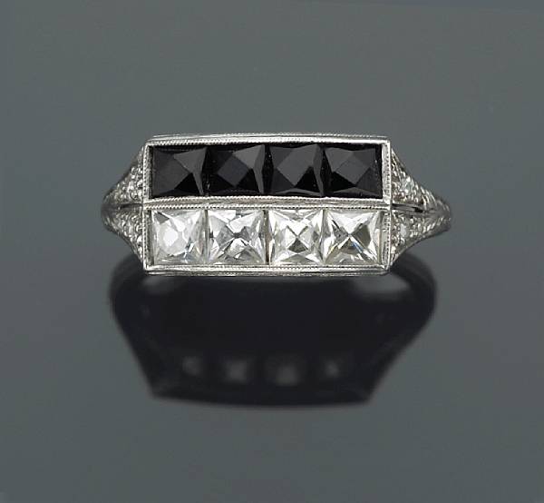 Appraisal: A diamond and black onyx ring mounted in platinum