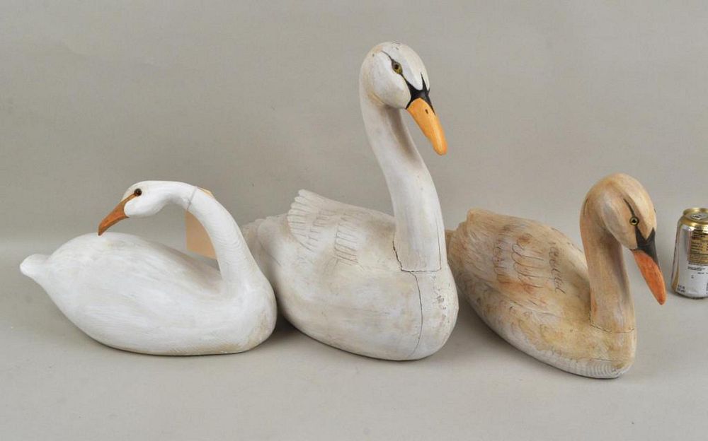 Appraisal: Three Carved Painted Swan Decoys Sculptures one unpainted signed D