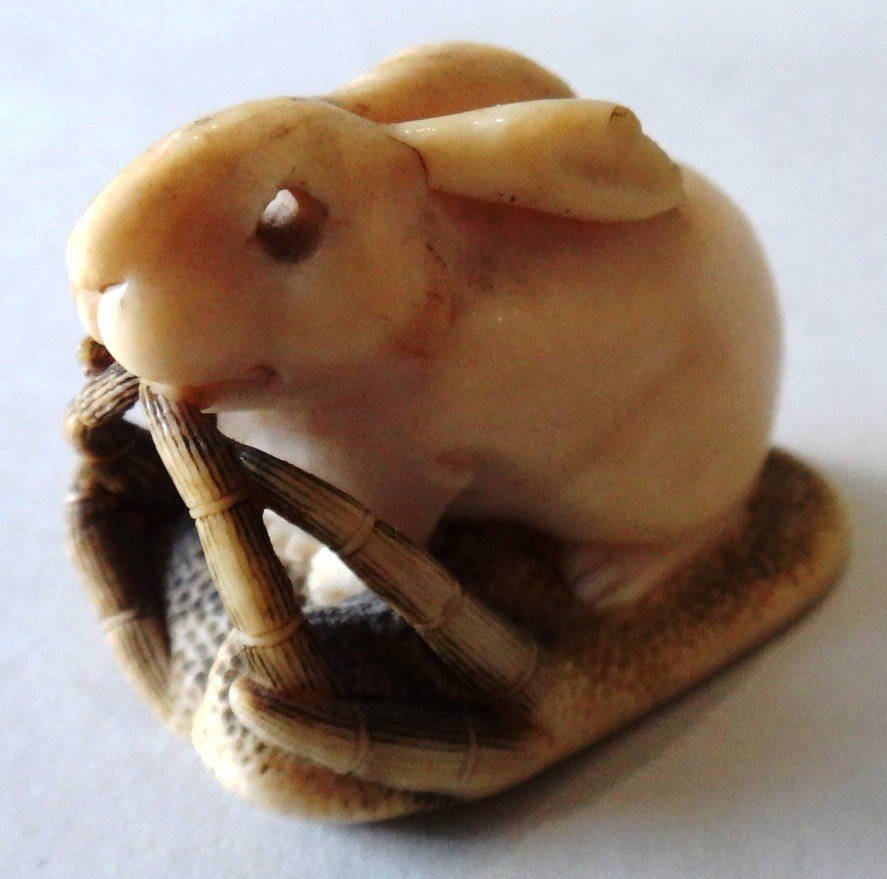 Appraisal: A Japanese ivory netsuke of a seated hare th century