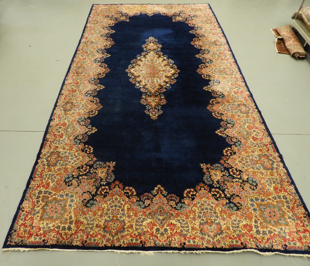 Appraisal: LARGE KERMAN NAVY BLUE PERSIAN ORIENTAL RUG CARPET Persia Mid