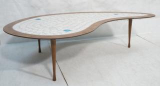 Appraisal: HOHENBERG Tile Top Teardrop Shaped Coffee Table Three legs White