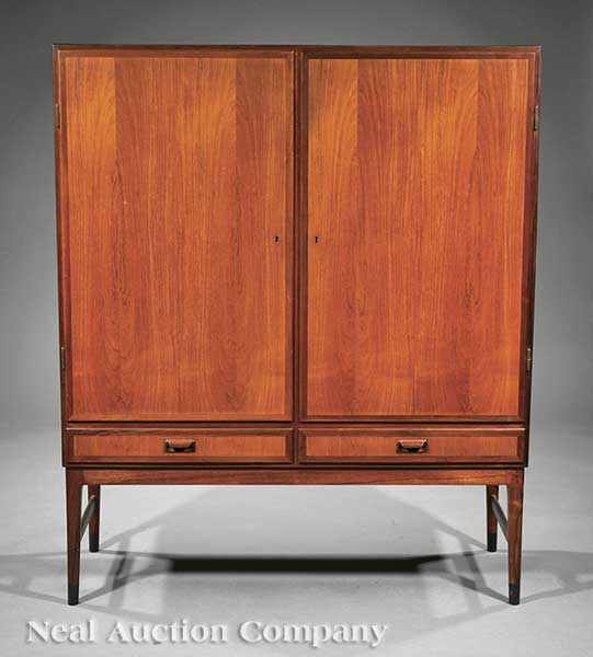 Appraisal: A Danish Modern Teakwood Cabinet-on-Stand c attributed to Ole Wanscher