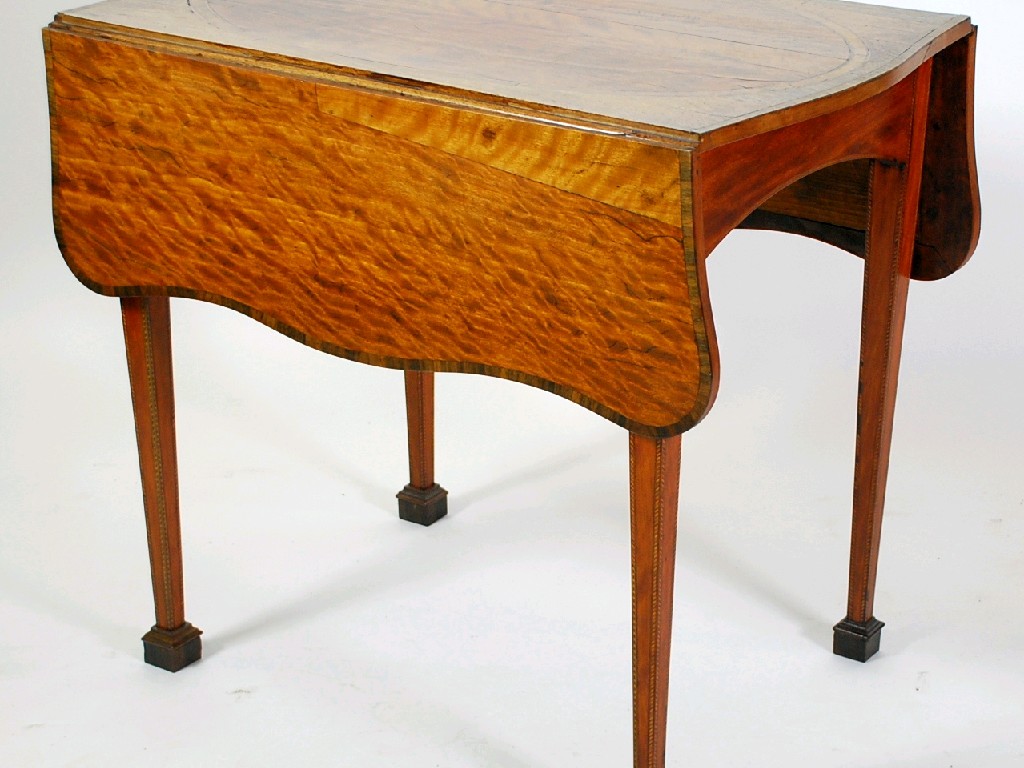 Appraisal: GEORGIAN INLAID MAHOGANY BUTTERFLY PEMBROKE TABLE the shaped oblong top