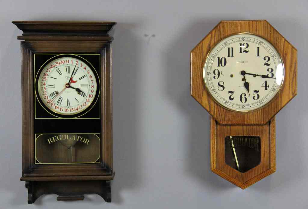 Appraisal: Wall Clocks including RegulatorConsisting of a Howard Miller Regulator wall