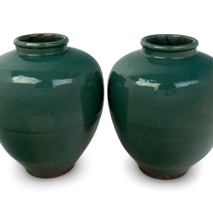 Appraisal: A Pair of Green Glazed Porcelain Vases Height inches Property