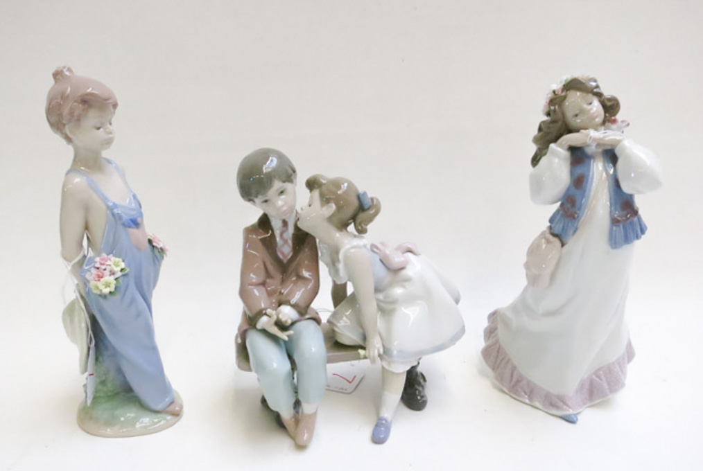 Appraisal: THREE LLADRO PORCELAIN FIGURINES Ten and Growing by sculptor Francisco