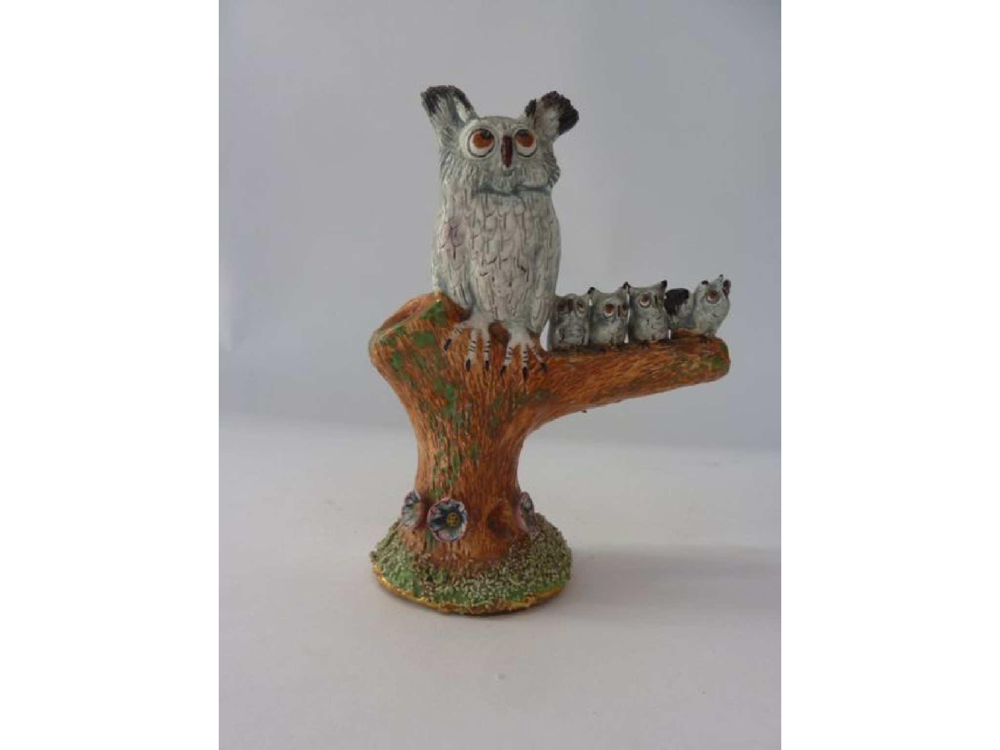 Appraisal: A humorous ceramic group by Bernard Matthews showing an owl