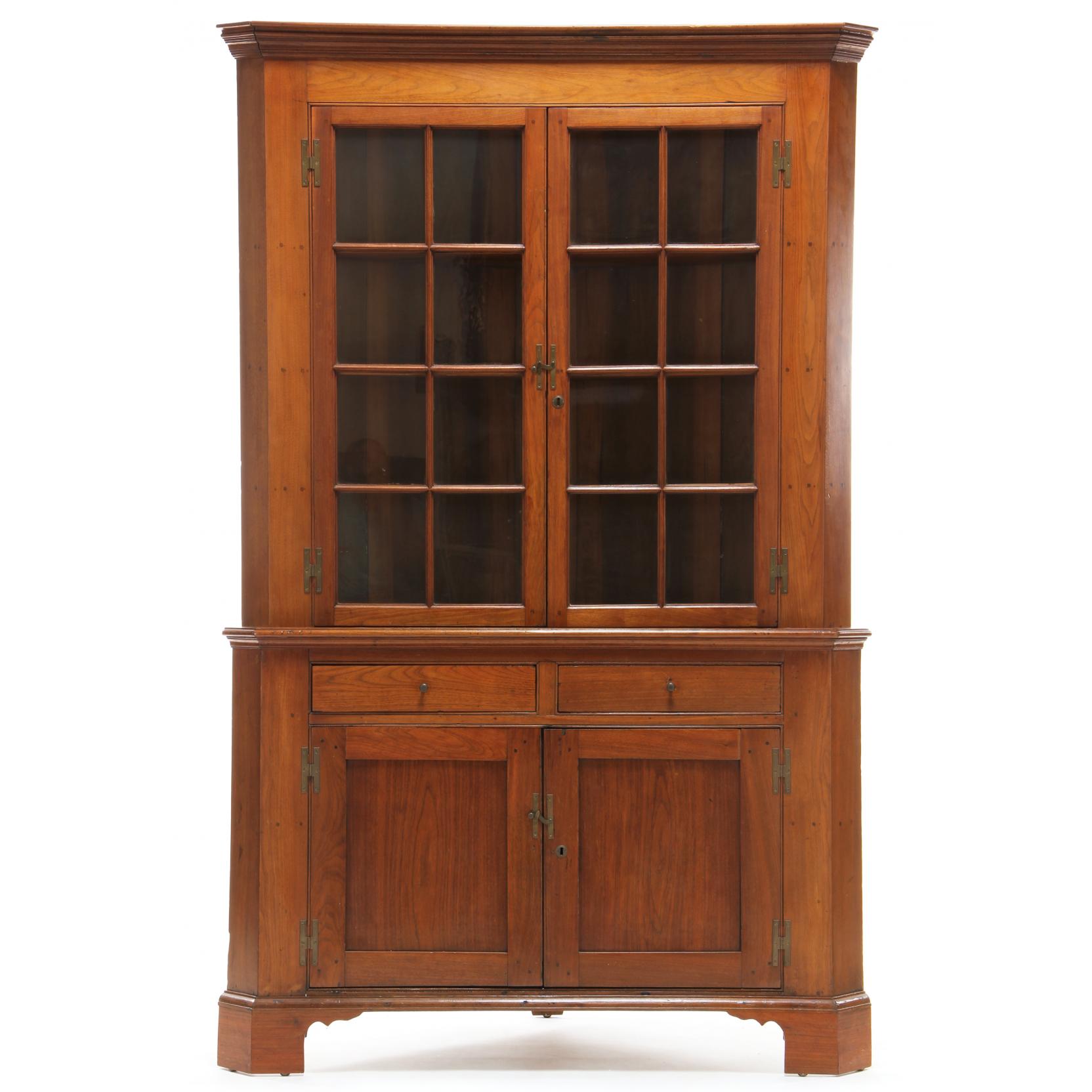 Appraisal: North Carolina Corner Cupboard early th century walnut poplar secondary