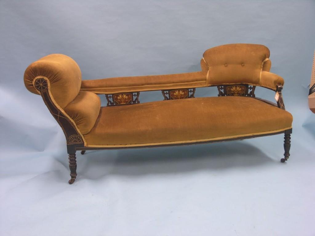 Appraisal: A Victorian inlaid mahogany chaise longue three splats inlaid with