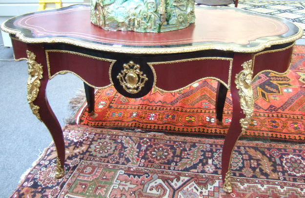 Appraisal: A Louis XIV style centre table the shaped top with