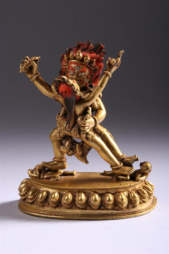 Appraisal: TIBETAN GILT BRONZE FIGURES OF VAJRAPANI AND CONSORT Stepping in