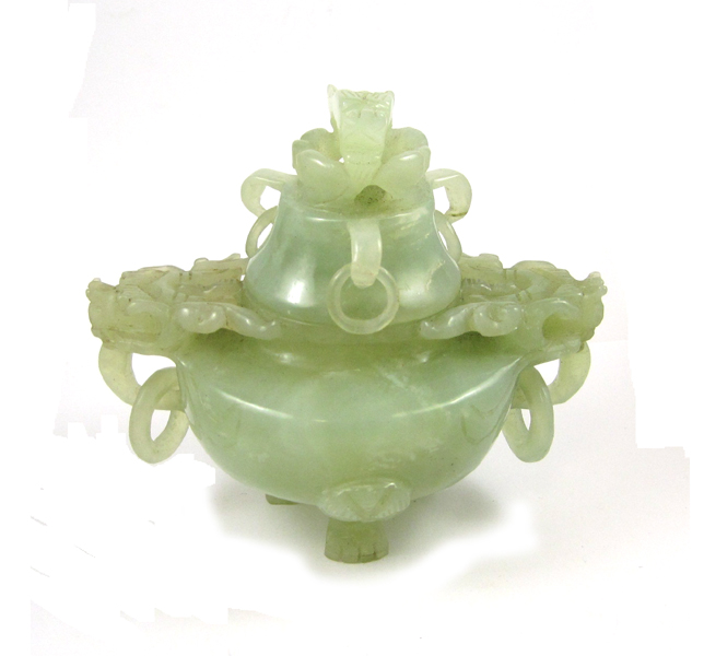 Appraisal: CHINESE CARVED JADE FOOTED URN having dragon head and ring