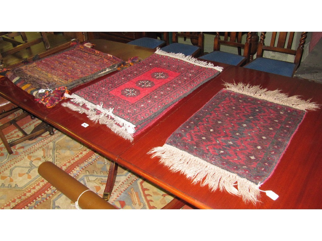 Appraisal: Lot comprising camel blanket and three small rugs