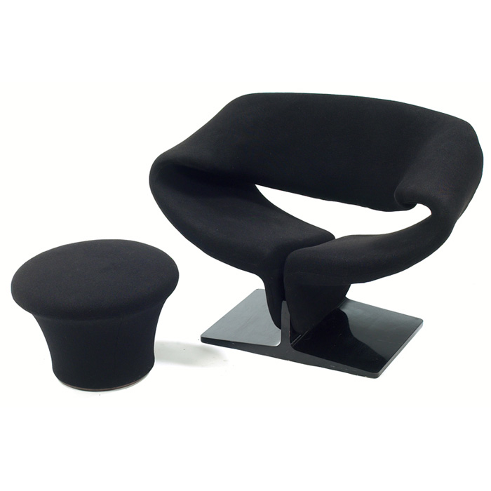 Appraisal: Pierre Paulin ribbon chair and round ottoman by Artifort The