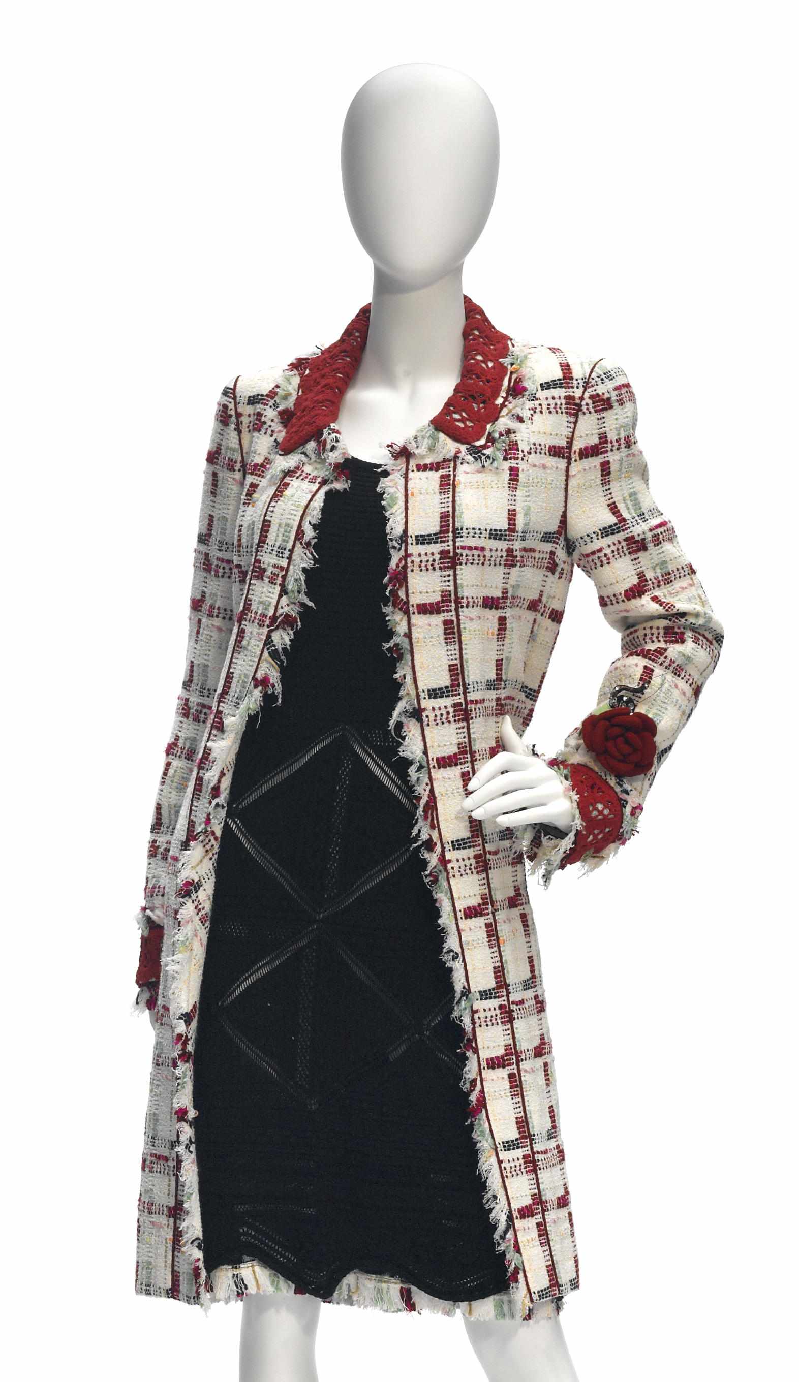 Appraisal: A Chanel embellished coat and sleeveless dress the coat is